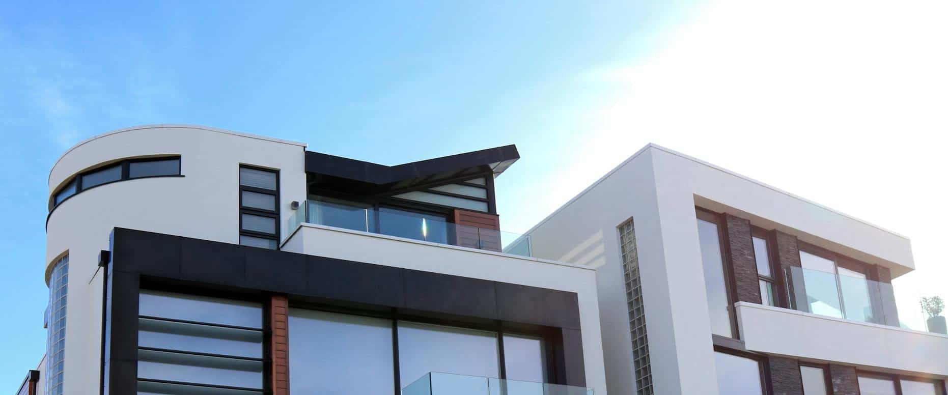 Contemporary Luxury Home With Glass Balconies In Poole, Uk, Showcasing Modern Architectural Design. Contemporary Luxury Home With Glass Balconies In Poole, Uk, Showcasing Modern Architectural Design.